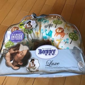 Boppy, feeding and infant support pillow